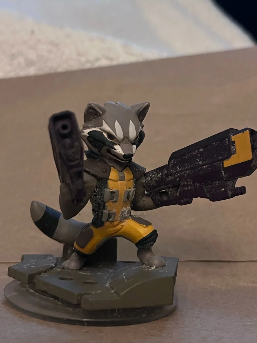 Disney Rocket Raccoon Figure in Yellow and Gray